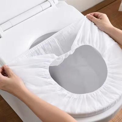 China Waterproof Disposable Toilet Seat Covers For Travel Hotel Non Woven for sale