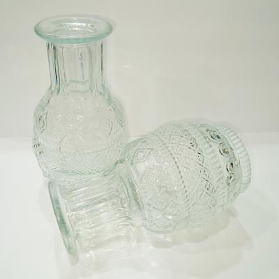 中国 Transparent Bud Pot Bulk Custom Round Nordic Mini Cylinder Clear Glass Flower Vase 販売のため