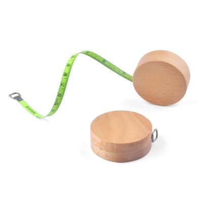 China Geometric Shape Metal Retractable Tape Measure 6ft 2m With Maple Wood Housing for sale