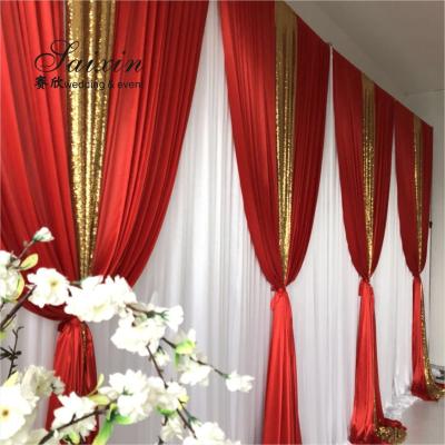 中国 Hot sale wedding backdrop double drape red curtains cross valance 販売のため