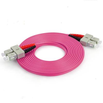 China SC de fibra óptica del cordón de remiendo del duplex multi del modo OM4 3,0 al cable del remiendo de la fibra del SC en venta