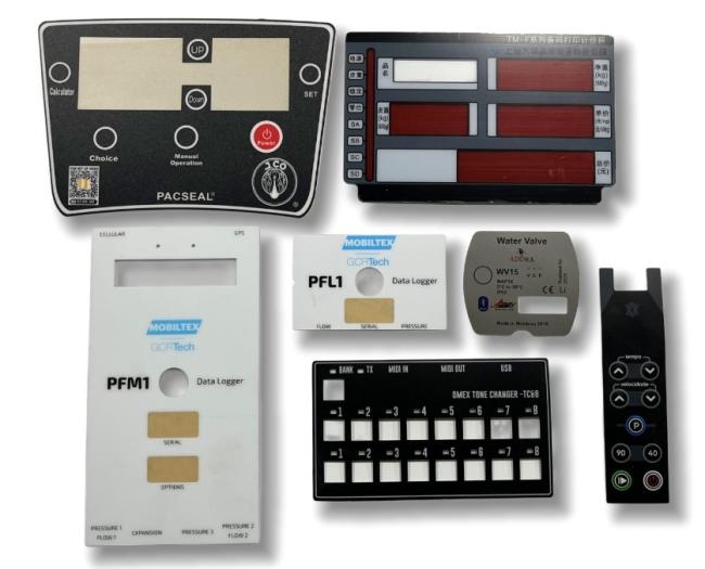 Collection of custom industrial graphic overlays and membrane switch front faceplates with printed control panels for various equipment