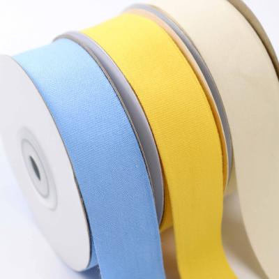 China 25 mm de cinta amarilla sólida de 100% de algodón de cinta por el patio en venta