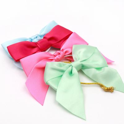 China Polyester Satin Pink Ribbon Bow ISO14001 Christmas Ribbon Bows for sale