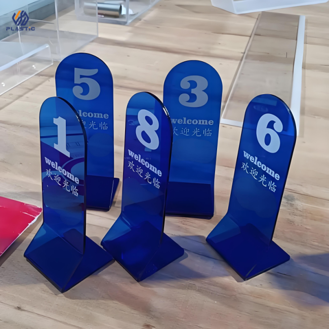 Acrylic sign holder in practical use displaying promotional material