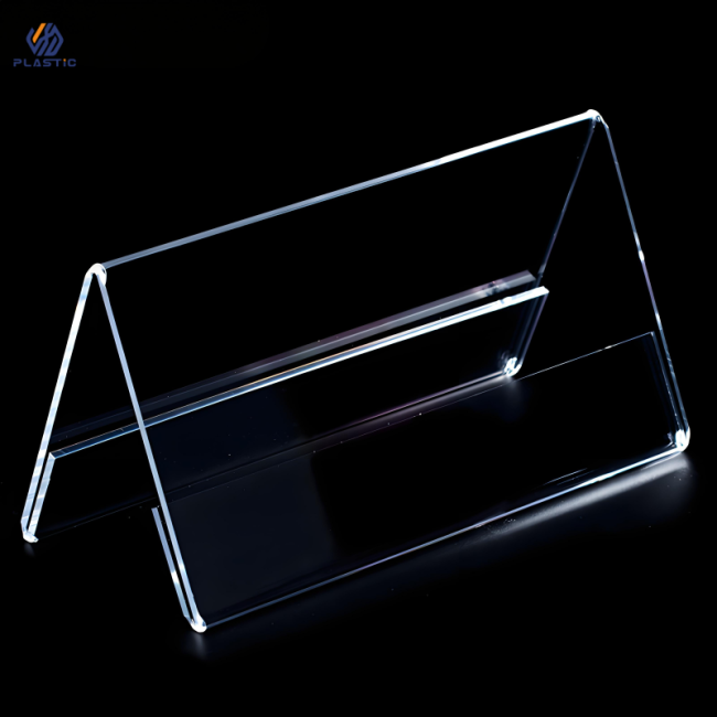 Multiple acrylic sign holders arranged together showing consistency in manufacturing