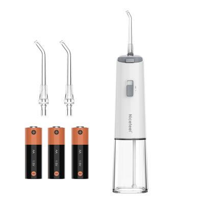 China Three Dry Batteries Rechargeable Dental Water Flosser With Tongue Scraper for sale