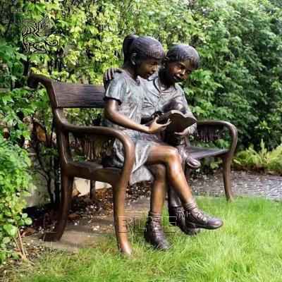 China BLVE Life Size Boy And Girl Reading Bronze Statues On Bench Park Metal Garden Decoration Sculpture for sale