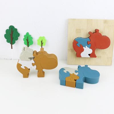 China Silicone and wooden jigsaw puzzle standing animal hippo puzzle kid toys for child playing for sale