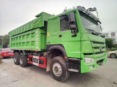 China Rueda RHD del verde 10 20 marca del camión volquete SINOTRUK de la tonelada con la dirección alemana ZF8118 en venta