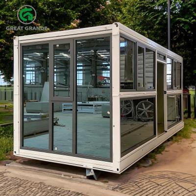 China Customized Glass Prefab Folding Container House Temporary Accommodation Resort for sale
