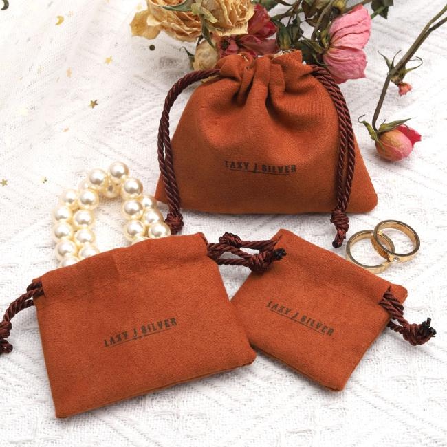 Close-up view of suede jewelry bag material and craftsmanship