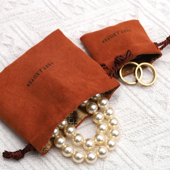 Jewelry bag interior showing storage capacity for necklaces and earrings