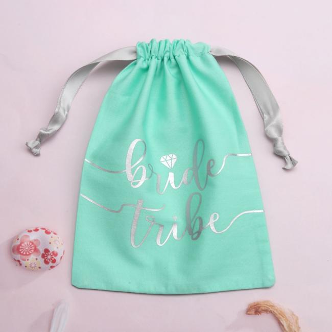 Custom dust bag packaging with drawstring closure demonstration
