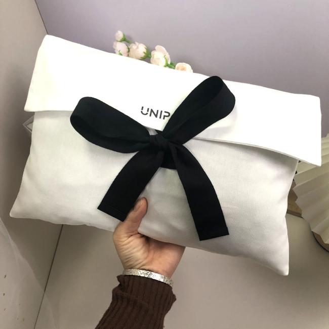 White cotton linen envelope bag packaging display