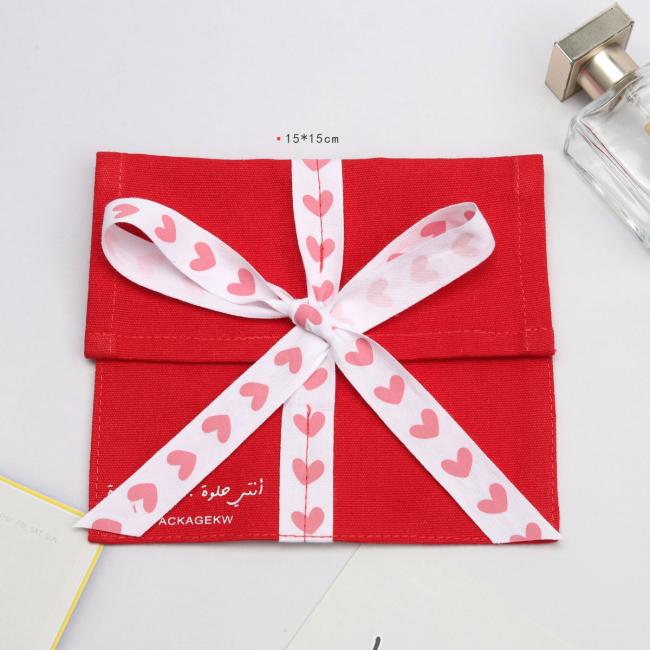 Close-up view of custom printed logo on canvas dust bag