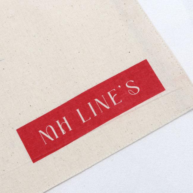 Organic cotton muslin envelope bag with bow - product in use protecting accessories