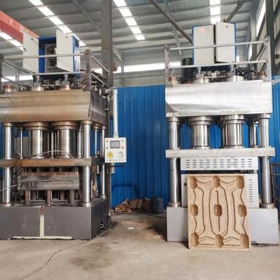 Chine 2 tonnes de charge de palette dynamique de Presswood ont pressé la machine en bois de palette à vendre