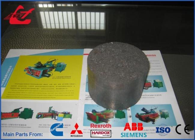 Close-up of metal briquettes produced by the press