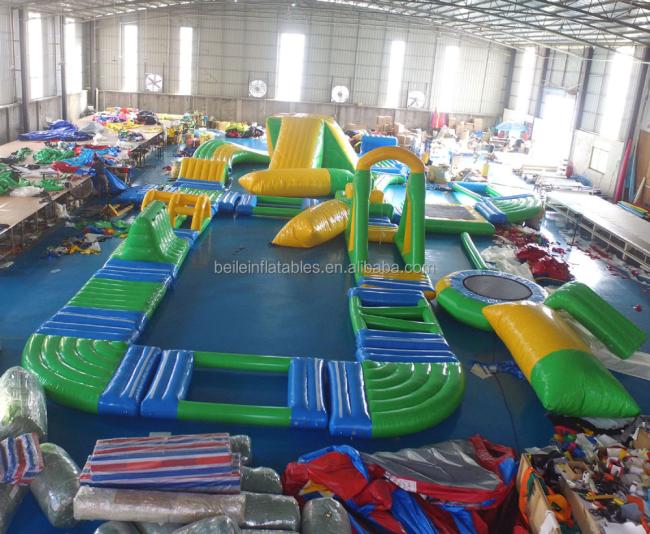 Customized outdoor PVC Tarpaulin inflatable Water park games for sales