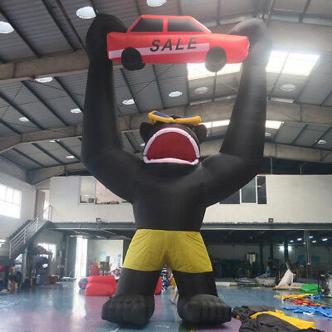 outdoor inflatable advertising gorillas holding a car models