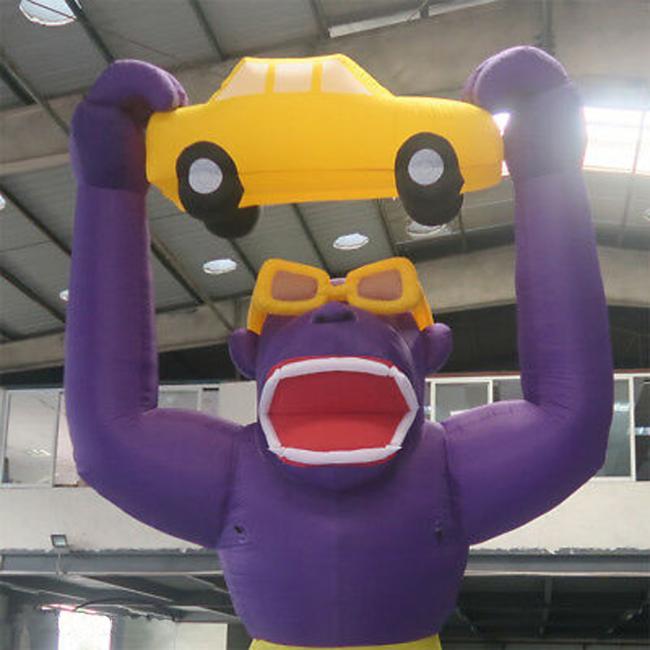 outdoor inflatable advertising gorillas holding a car models