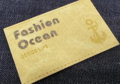 China Hot Sell Custom enamel PU Leather Jeans leather patch Metal Label With Press Logo On Leather for sale