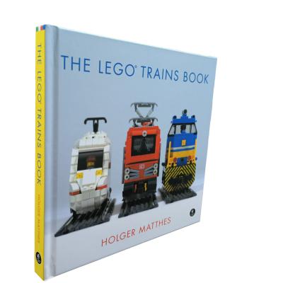 China The LEGO Trains Book | Offset Printing With Glossy Inner Pages Finish Art Book for sale