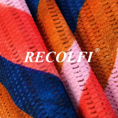 China Interfiliere ShangHai Exhibitor Knitting 4 Way Textured Jacquard Circular Recycled Spandex Fabric Matalan Beachwear for sale
