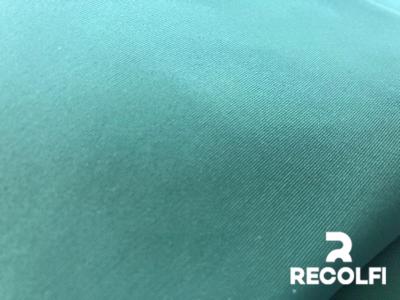 China Spandex de nylon hizo punto la tela sostenible del traje de baño modificó color para requisitos particulares sólido en venta