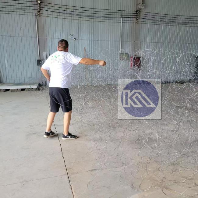 Installation demonstration of the wire barrier showing proper placement