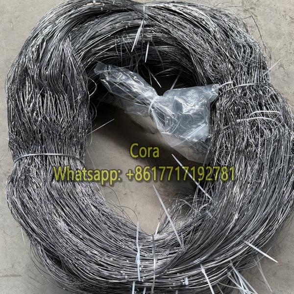 Low visibility wire barrier