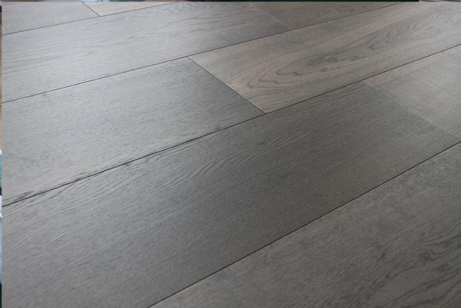 Chemical treated white oak engineered wood flooring in grey cloud color