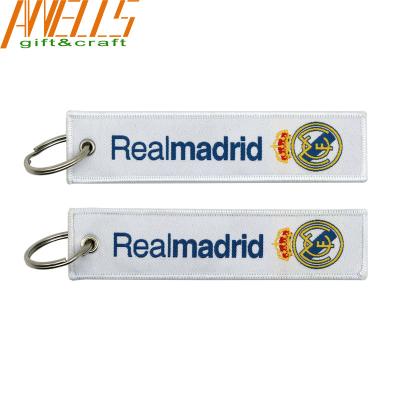 China Brand Name  Custom Woven Keychain No Shrinking For Travel Souvenir for sale