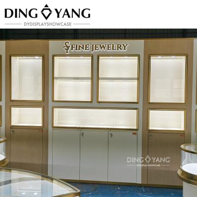 China Moderno estilo de moda Vitrine de parede de jóias de madeira com baixo consumo de energia LED à venda