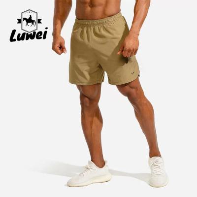 China Plus Size Gym Workout Shorts Casual Jogger Fitness Men Swim Beach Shorts for sale