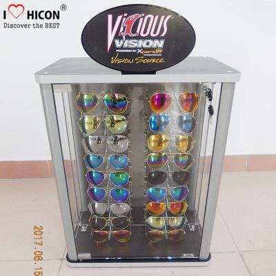 China Las lentes de la encimera venden el logotipo de encargo de la vitrina al por menor de acrílico para las gafas de sol en venta