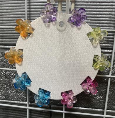 China Mini clipes de garras de flores de plástico para crianças, clipes de cabelo de flores multiuso à venda