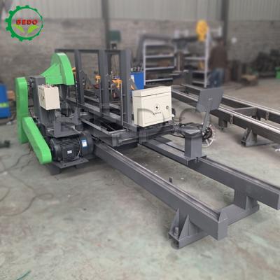 China High Performance Electric Wood Log Sliding Table Saw Machine PLC Control System for sale