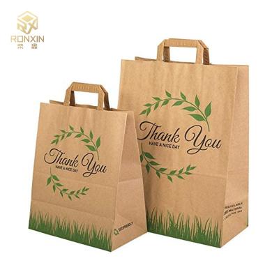 China Promotional Flat Handle Kraft Printed Paper Shopping Bag For Takeaway for sale
