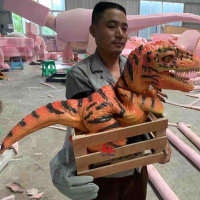 China Marioneta de mano realista de encargo del dinosaurio, marioneta de mano de T Rex del parque temático en venta