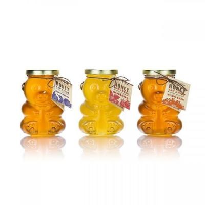China Transparent Empty Glass Jar Honey Bear Shaped Jar For Food Storage for sale