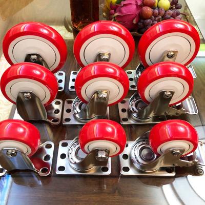 China 5 Inch Medium Duty Red PU Swivel Locking Stainless Steel Casters With Dust Covers for sale