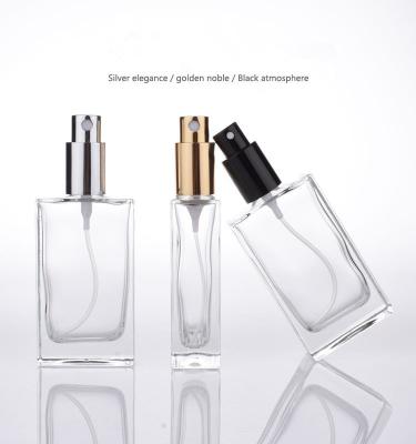 China Flat Square Glass Perfume Spray Bottles Metallic Pump 50ml Capacity Refillable for sale