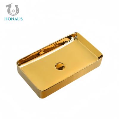 China Luxury Bathroom Countertop Basin Electroplated Gold Ceramic Mirror Surface en venta