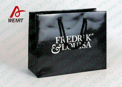 China Black Glossy Lamination Custom Printed Retail Bags , Modern Kraft Paper Shopping Bags for sale
