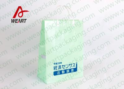 China Customized Art Paper Bag With Plastic Handles LOGO Printing For Storage for sale