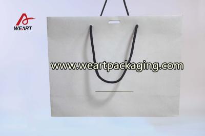 China Luxury Paper Shopping Bag , Ribbon Tie Personalized Gift Bags With Handles for sale