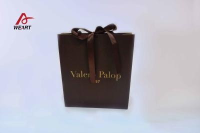 China Surface Hot Stamping Personalised Paper Carrier Bags With Ribbon Bowknot for sale