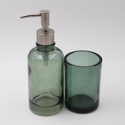 Chine L'ensemble en verre moderne léger de bouteilles de distributeur de savon a épaissi 250ml à vendre